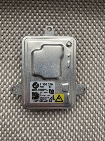 Блок розпалу ксенону bmw f30 f31 f32 f33 f34 f01 f02 f25 f26 f15 f16 e89 63117356250 7356250 J008 фото